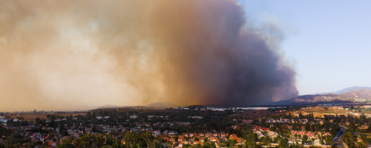 Wildfire smoke over residential neighborhood