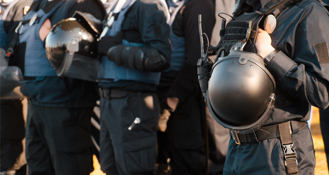 police officers standing in riot gear